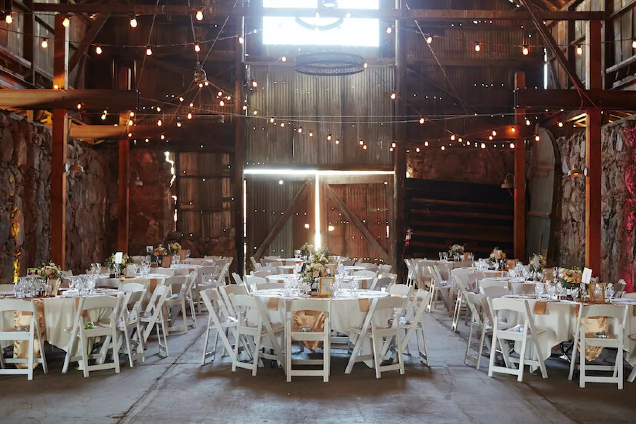 19 Rustic Barn Wedding Venues We Love In The United States Wedding   529 Barn%2Bwedding%2Bvenue%2Bwith%2Bwhite%2Bchairs .webp