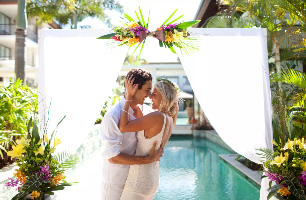 bride and groom at a tropical wedding venue